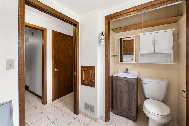 614 8th St, Fond Du Lac, WI 54935 - bathroom featuring vanity and tile patterned flooring