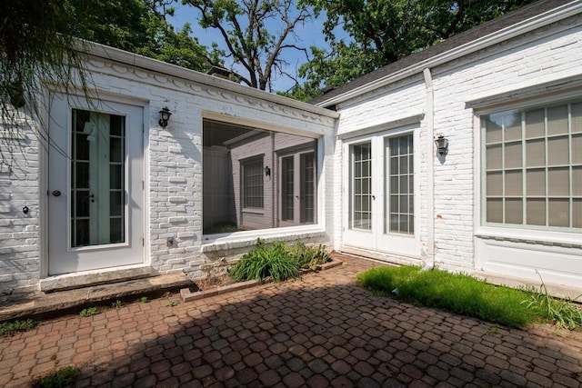 645 Wisconsin St, Oshkosh, WI 54901 - view of patio featuring french doors