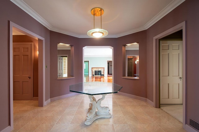 645 Wisconsin St, Oshkosh, WI 54901 - corridor featuring ornamental molding and light tile patterned floors