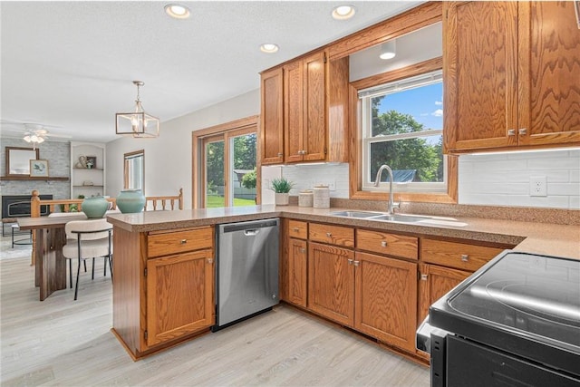3203 Canterbury Cir, Saint Paul, MN 55125 - kitchen featuring dishwasher, range with electric stovetop, a peninsula, brown cabinets, and recessed lighting
