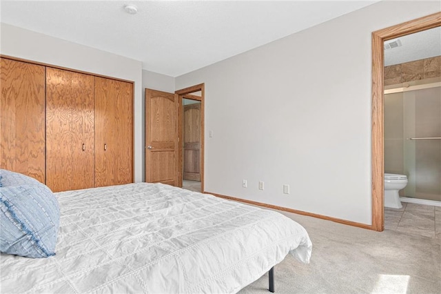 3203 Canterbury Cir, Saint Paul, MN 55125 - bedroom with a closet, ensuite bath, and carpet floors