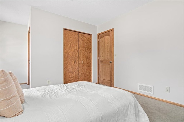 3203 Canterbury Cir, Saint Paul, MN 55125 - carpeted bedroom with a closet and baseboards