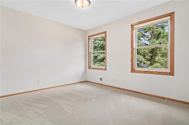 3203 Canterbury Cir, Saint Paul, MN 55125 - spare room featuring light colored carpet