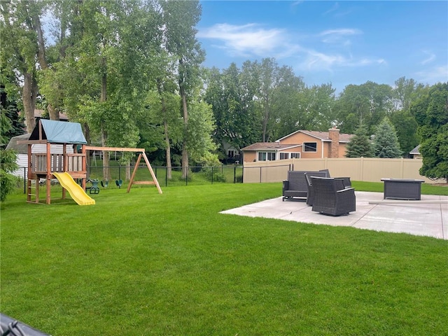 3203 Canterbury Cir, Saint Paul, MN 55125 - view of yard with a patio, a playground, and view of wooded area