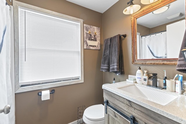W6815 N Walworth Rd, Walworth, WI 53184 - bathroom with vanity and toilet