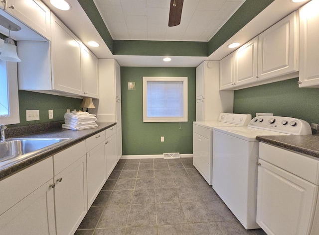 1716 Oak St, Stevens Point, WI 54481 - laundry room with independent washer and dryer, cabinet space, a ceiling fan, and recessed lighting