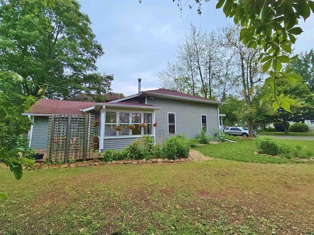 1716 Oak St, Stevens Point, WI 54481 - back of property featuring a yard