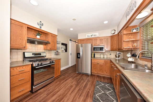 N68W15240 Prudence Dr, Menomonee Falls, WI 53051 - kitchen featuring open shelves, appliances with stainless steel finishes, under cabinet range hood, dark wood-style floors, and recessed lighting