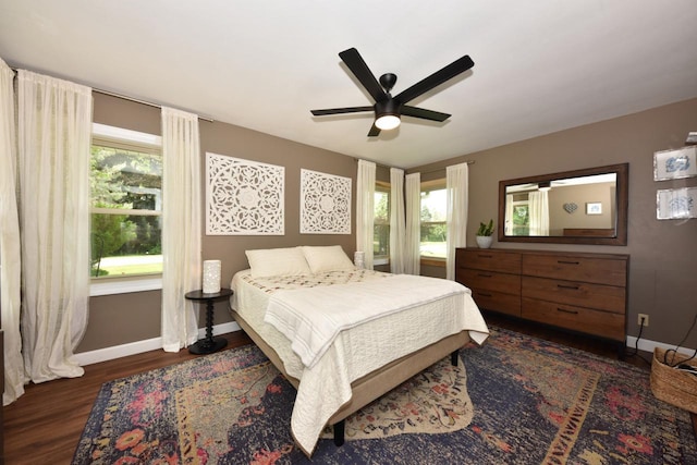 N68W15240 Prudence Dr, Menomonee Falls, WI 53051 - bedroom with wood finished floors, multiple windows, and a ceiling fan