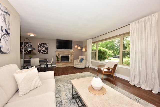 N68W15240 Prudence Dr, Menomonee Falls, WI 53051 - living room with wood finished floors and a stone fireplace