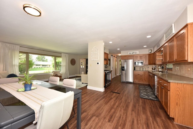 N68W15240 Prudence Dr, Menomonee Falls, WI 53051 - dining space with dark wood-style floors and recessed lighting