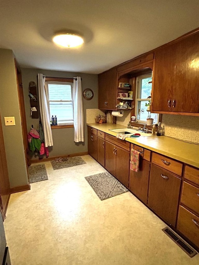 3151 Reddin Rd, Wisconsin Rapids, WI 54495 - kitchen with light countertops, light flooring, and open shelves