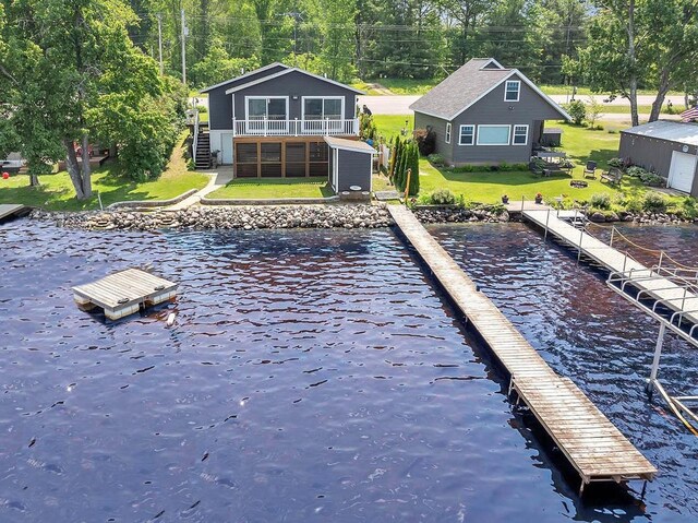 11975 E Anderson Lake Dr, Suring, WI 54174 - dock featuring a water view, stairway, a yard, and a view of trees