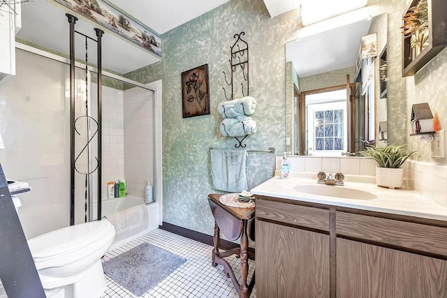 11975 E Anderson Lake Dr, Suring, WI 54174 - full bath with wallpapered walls, vanity, tile patterned flooring, and bath / shower combo with glass door