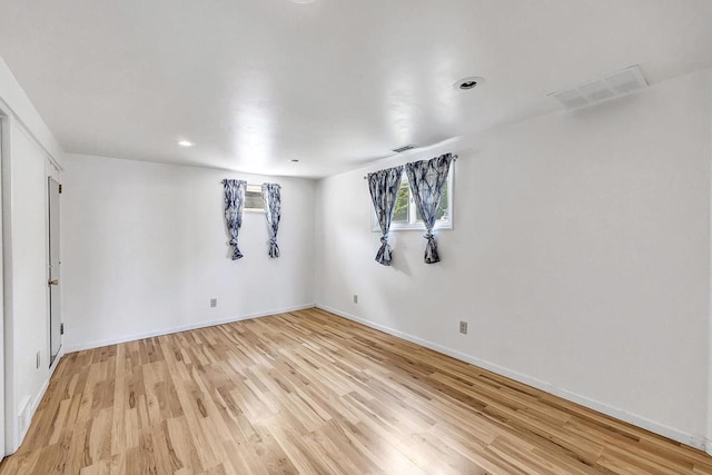 11975 E Anderson Lake Dr, Suring, WI 54174 - unfurnished room with light wood-type flooring and recessed lighting