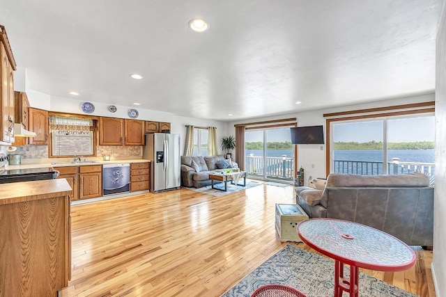11975 E Anderson Lake Dr, Suring, WI 54174 - living area with light wood-style floors and recessed lighting