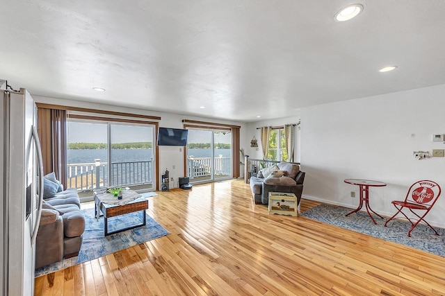 11975 E Anderson Lake Dr, Suring, WI 54174 - living area with light wood-style floors and recessed lighting