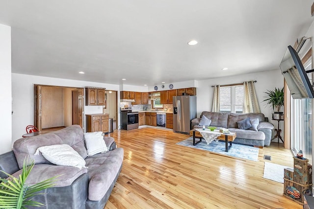 11975 E Anderson Lake Dr, Suring, WI 54174 - living area with light wood-type flooring and recessed lighting