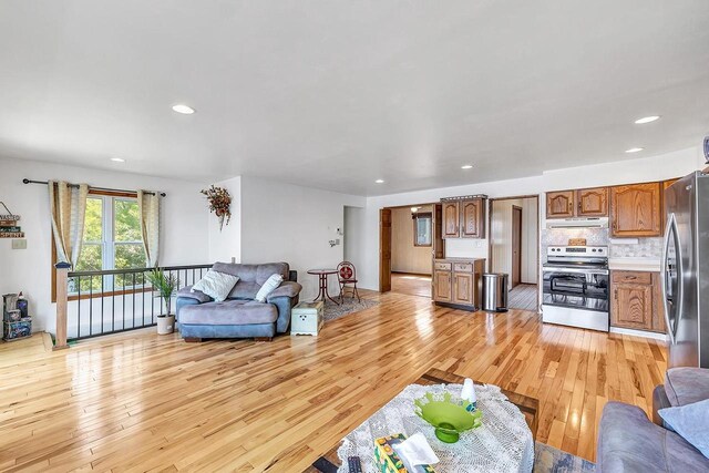 11975 E Anderson Lake Dr, Suring, WI 54174 - living area with light wood-type flooring and recessed lighting