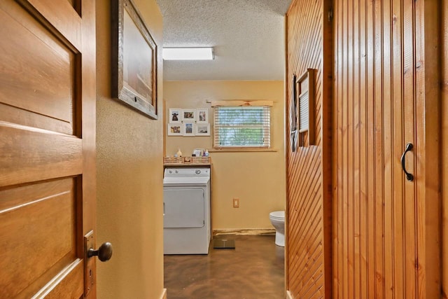 7454 State Highway 186, Arpin, WI 54410 - hallway with washer / dryer, finished concrete floors, and a textured ceiling