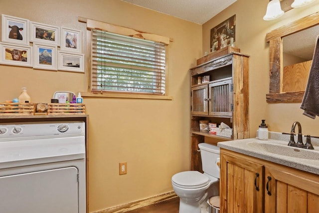 7454 State Highway 186, Arpin, WI 54410 - bathroom featuring washer / dryer and vanity