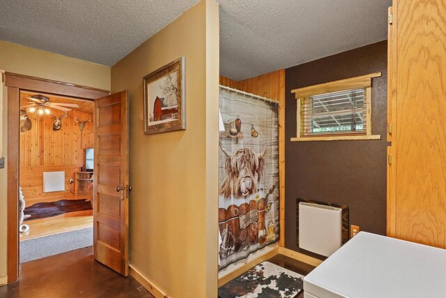 7454 State Highway 186, Arpin, WI 54410 - bathroom with a textured ceiling, ceiling fan, curtained shower, and heating unit
