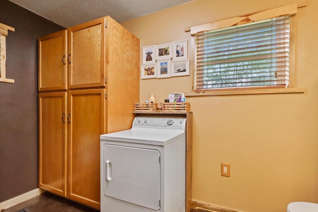 7454 State Highway 186, Arpin, WI 54410 - washroom with washer / dryer, cabinet space, and a textured ceiling