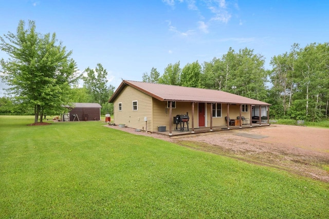 7454 State Highway 186, Arpin, WI 54410 - view of front of house featuring a front lawn and a metal roof