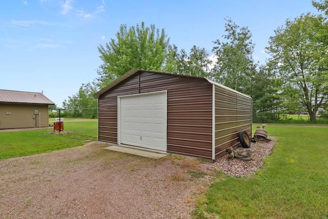 7454 State Highway 186, Arpin, WI 54410 - detached garage featuring driveway