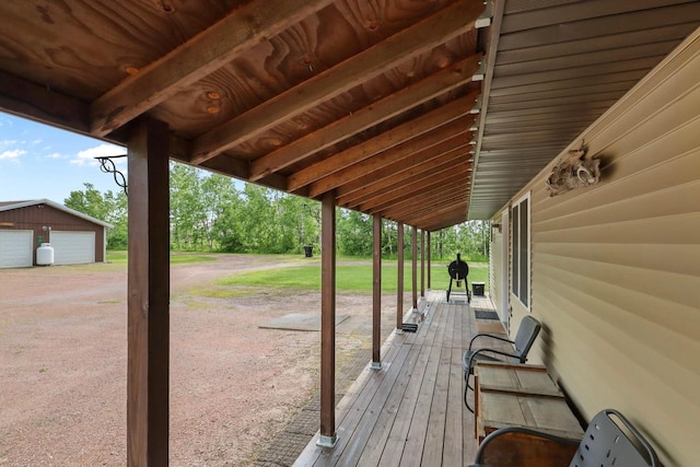 7454 State Highway 186, Arpin, WI 54410 - wooden deck with an outbuilding