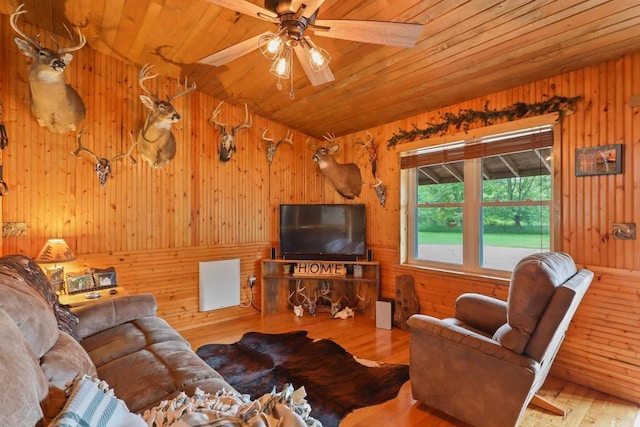 7454 State Highway 186, Arpin, WI 54410 - living room with wooden walls, hardwood / wood-style flooring, wooden ceiling, ceiling fan, and lofted ceiling