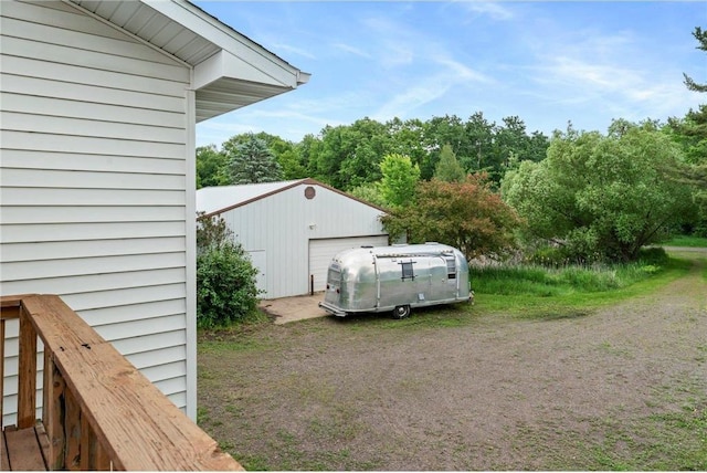 1231 135th St, Amery, WI 54005 - view of yard with an outdoor structure and a detached garage