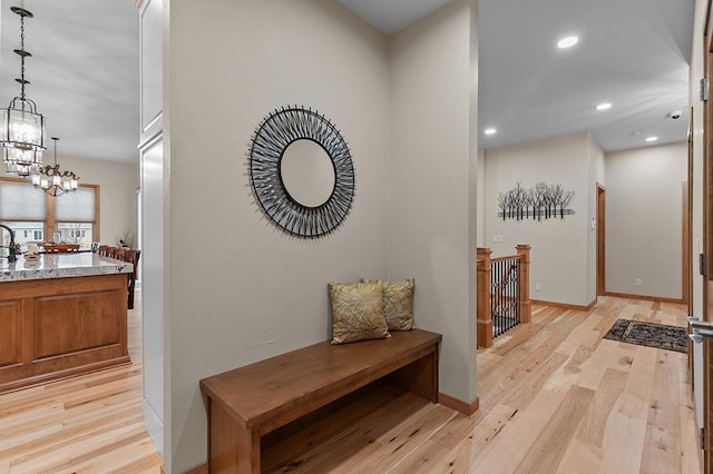 4140 N Prairie Rose Ln, Appleton, WI 54913 - hall featuring light wood finished floors, recessed lighting, and a chandelier