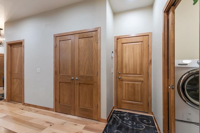 4140 N Prairie Rose Ln, Appleton, WI 54913 - laundry room with washer / dryer and light wood-style flooring
