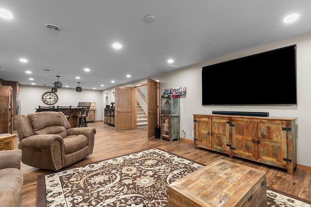 4140 N Prairie Rose Ln, Appleton, WI 54913 - living area featuring stairway, recessed lighting, wood finished floors, and bar
