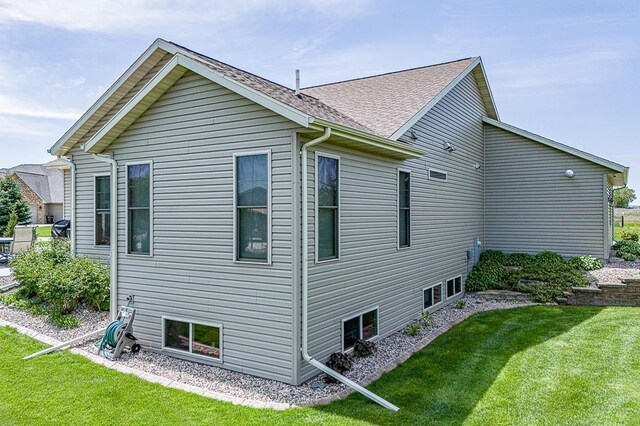 4140 N Prairie Rose Ln, Appleton, WI 54913 - view of home's exterior with a lawn and a shingled roof