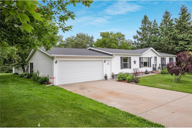 635 S 6th St, Barron, WI 54812 - view of front facade featuring a garage, a front lawn, driveway, and roof with shingles