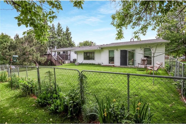 635 S 6th St, Barron, WI 54812 - back of property featuring a fenced backyard and a wooden deck