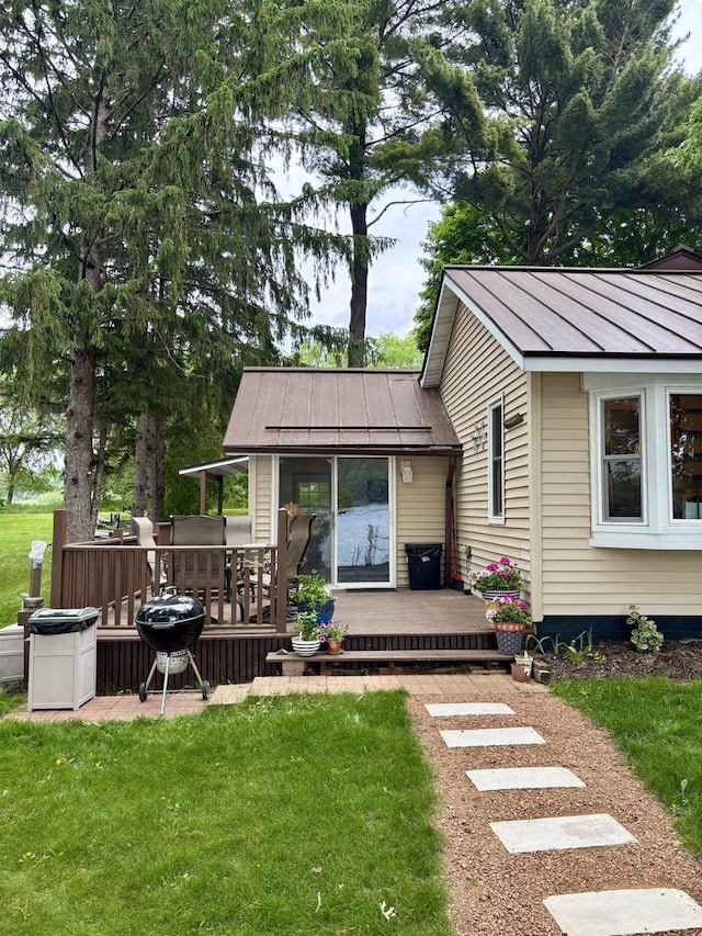 N3911 Lakeside Ln, Wautoma, WI 54982 - view of green lawn with a wooden deck