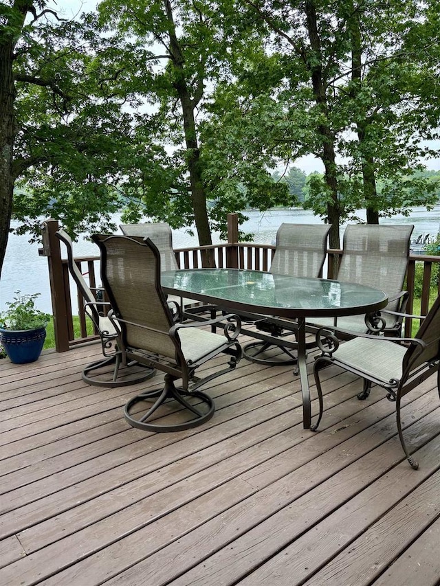 N3911 Lakeside Ln, Wautoma, WI 54982 - wooden deck featuring outdoor dining area