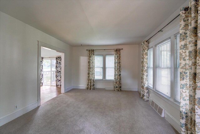 31 Elm St, Fort Atkinson, WI 53538 - empty room featuring plenty of natural light and carpet floors