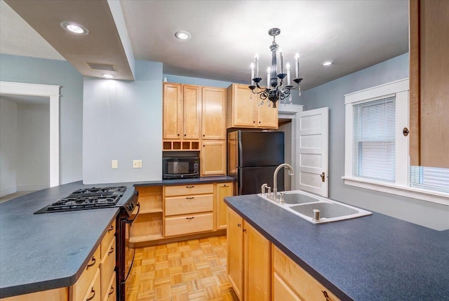 31 Elm St, Fort Atkinson, WI 53538 - kitchen with range with gas stovetop, freestanding refrigerator, light brown cabinetry, and recessed lighting
