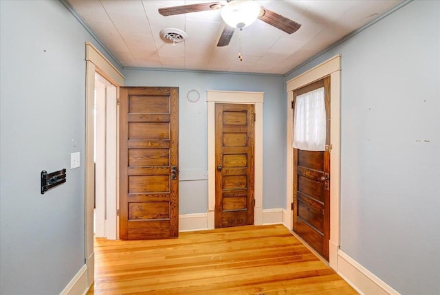 31 Elm St, Fort Atkinson, WI 53538 - foyer entrance featuring wood finished floors and ceiling fan