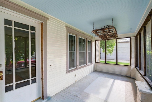 31 Elm St, Fort Atkinson, WI 53538 - unfurnished sunroom featuring wood finished floors