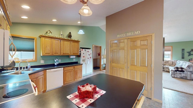 201 N 6th St, Colby, WI 54421 - kitchen featuring white appliances, dark countertops, lofted ceiling, decorative light fixtures, and recessed lighting