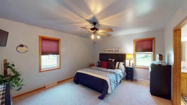 201 N 6th St, Colby, WI 54421 - bedroom with light colored carpet and a ceiling fan