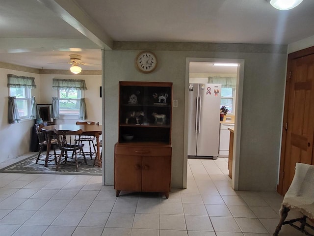 9317 N Arrowhead Shores Rd, Edgerton, WI 53534 - dining room with light tile patterned flooring and ceiling fan