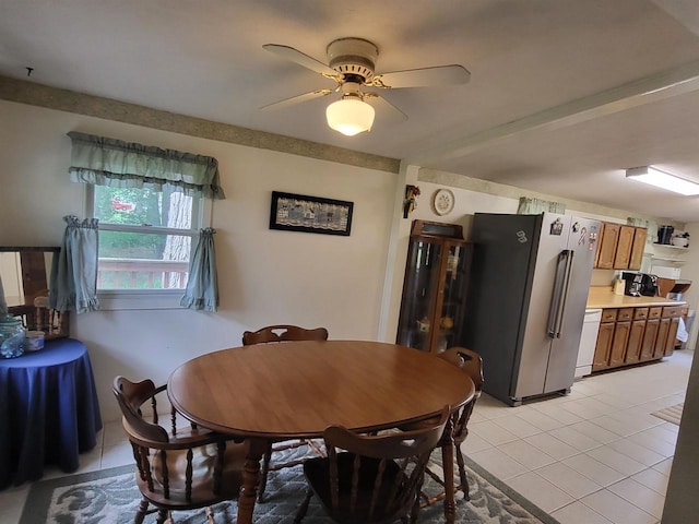 9317 N Arrowhead Shores Rd, Edgerton, WI 53534 - dining room featuring light tile patterned floors and a ceiling fan