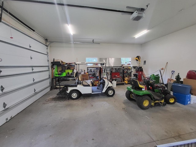 9317 N Arrowhead Shores Rd, Edgerton, WI 53534 - garage featuring a garage door opener