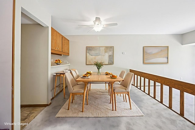 W166N9162 Grand Ave Unit 2, Menomonee Falls, WI 53051 - dining room featuring a ceiling fan and carpet floors